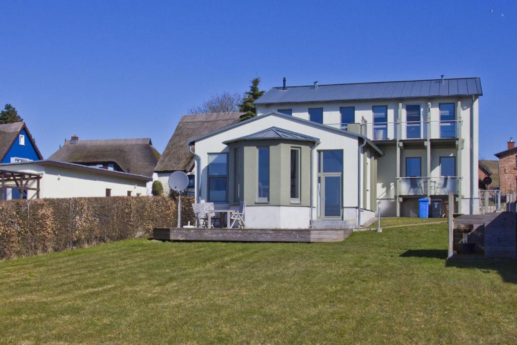 Ferienhaus Distelfink Fewo Balkon Meerblick | Gross Zicker