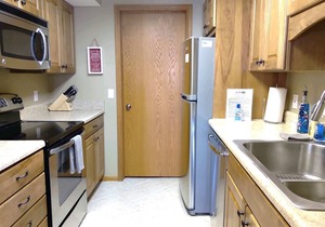 #23 ELK RAPIDS BEACH CONDOMINIUM