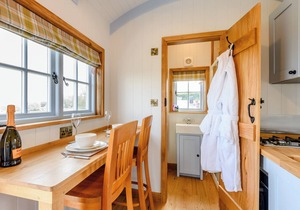 A perfectly formed shepherds hut that has been styled and furnished with flair.