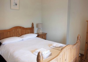 A Semi-detached cottage with open plan living space, located in a fabulous setting.