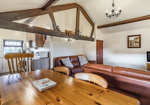 A spacious cottage with a first floor living space boasting far reaching views.
