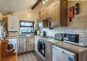 A spacious cottage with a first floor living space boasting far reaching views.