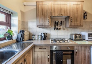 A spacious cottage with a first floor living space boasting far reaching views.