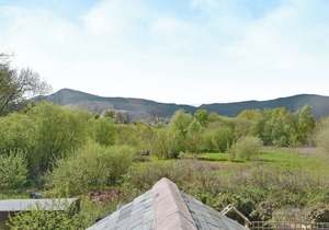 A well placed semi-detached cottage with fell views.