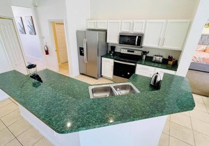 Ample space and modern elegance await at this 5/3 Pool Home located at Highlands Reserve Golf and Country Club