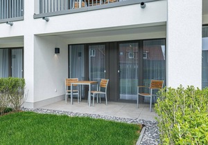 Apartment near the North Sea with terrace, parking, use of swimming pool & sauna -
