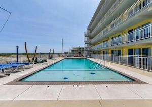 Beachfront Condo with Pool about 2 Mi to Boardwalk!