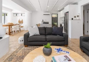 Beautifully designed 4 bedroom, 4 bathroom home right across the road from beach