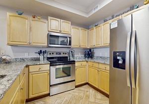 Bright & beachy waterfront condo with pools, tennis, gym, spacious balcony & W/D