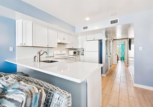 COME AND ENJOY this beautifully decorated beachfront townhome where you can soak up the sun!