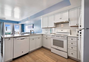 COME AND ENJOY this beautifully decorated beachfront townhome where you can soak up the sun!