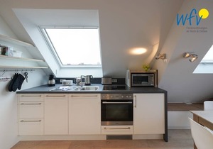 Comfortable penthouse apartment with sunny south-facing balcony!