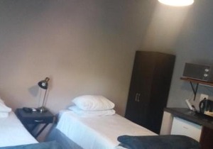 Comfy room with dstv and aircon in convenient location