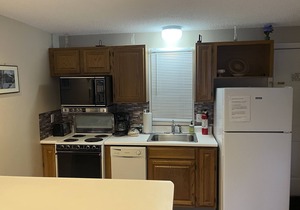 Condo with WiFi, private beach, full kitchen, & outdoor pool