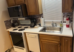 Condo with WiFi, private beach, full kitchen, & outdoor pool