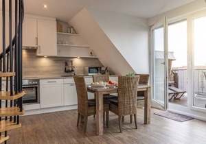 Contemporary and modern: The bright, feel-good top-floor maisonette apartment