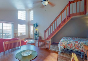 Cozy dog-friendly condo with loft near the beach! Enjoy ocean views & more!