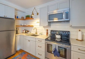Designer decorated in an amazing central location w/rooftop deck!
