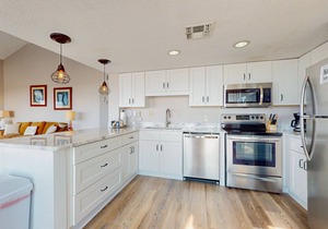 Direct gulf front condo with pools, hot tubs & central AC