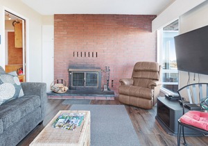 Dog-friendly, oceanfront condo w/ beach access, cozy fireplace, and large deck