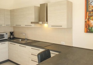 Enjoy a wonderful sea view in this vacation apartment with community pool.