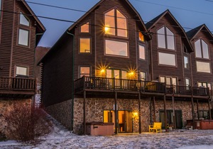 Enjoy lake access and ski slope views!