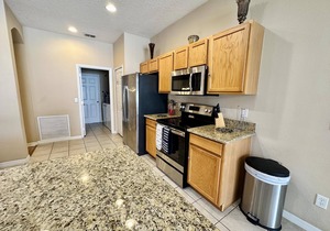 Envious Highlands Reserve pool home with recent upgrades.