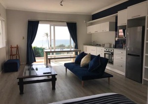 Exclusive Beachfront Apartment with sea views