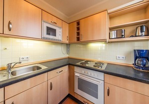 Family-friendly vacation apartment close to the beach with balcony and North Sea view - Hus