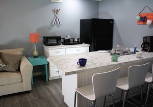 Family owned vacation suite conveniently located across from Lake Huron beach.