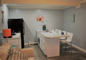 Family owned vacation suite conveniently located across from Lake Huron beach.