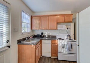 Gated Midtown Cottage with Perfect Location!