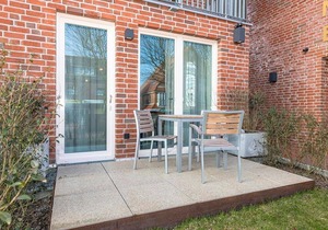 Great, modern island apartment with sunny terrace incl. sauna area in the house