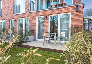 Great, modern island apartment with sunny terrace incl. sauna area in the house