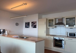Great penthouse with 54 sqm roof terrace, sea view, sauna and hot tub! -