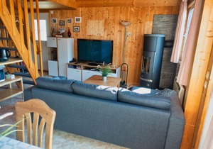 Holiday house with 3 bedrooms directly on the Useriner See with bathing beach, fireplace