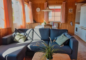 Holiday house with 3 bedrooms directly on the Useriner See with bathing beach, fireplace