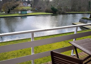 Imagine relaxing on the patio, watching the boats and river life pass by.