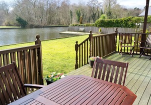 Imagine relaxing on the patio, watching the boats and river life pass by.