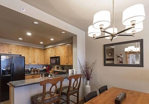Immaculate ski in ski out condo - direct ski in and out, winter hot tub , gym, covered parking!!