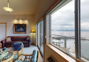Lakefront condo with water-view balcony, central AC & swimming dock