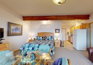 Lakefront condo with water-view balcony, central AC & swimming dock