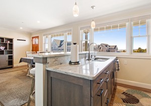 Located directly on the white sands of Pine Point Beach.