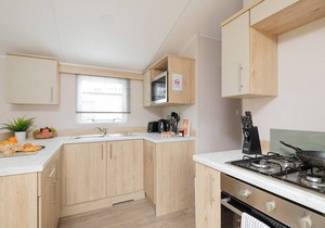 Modern and comfortable 2-bedroom caravan with one double and one twin.