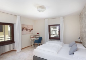 Modern, Centrally Located Apartment "RivApartmentsDowntowN - Love" with a View of the Old Town of Riva del Garda, A/C & Wi-Fi