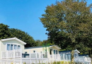Modern lodge with one double with ensuite shower and one twin.