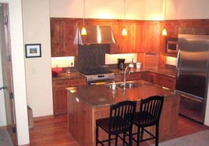 Near River Run, heated parking, walk to Ketchum. Living space on one level.