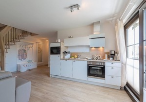 New, bright and friendly beach vacation apartment for up to 6 people with sauna house.