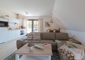 New, bright and friendly beach vacation apartment for up to 6 people with sauna house.