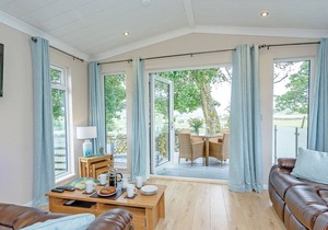 New in 2017. Modern and contemporary 14ft-wide lodge style holiday home.